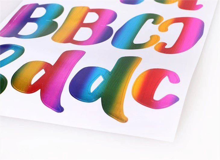 Stikers tal-alfabet tal-fojl tal-folja tal-istikers tal-ittri tal-vinil li jwaħħlu
